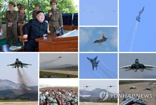 (서울=연합뉴스) 북한군은 4일 김정은이 참관한 가운데 '항공 및 반항공군 비행지휘관들의 전투비행술 경기대회-2017'을 진행했다고 노동신문이 5일 보도했다. 사진은 조종사들의 비행 모습을 지켜보는 김정은. 2017.6.5       [국내에서만 사용 가능. 재배포 금지. For Use only in the Republic of Korea. No Redistribution]     nkphoto@yna.co.kr
