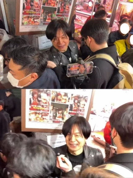 지난 7일 수원 지동못골시장에서 일부 유튜버들과 지지자들에 둘러싸인 주진우씨