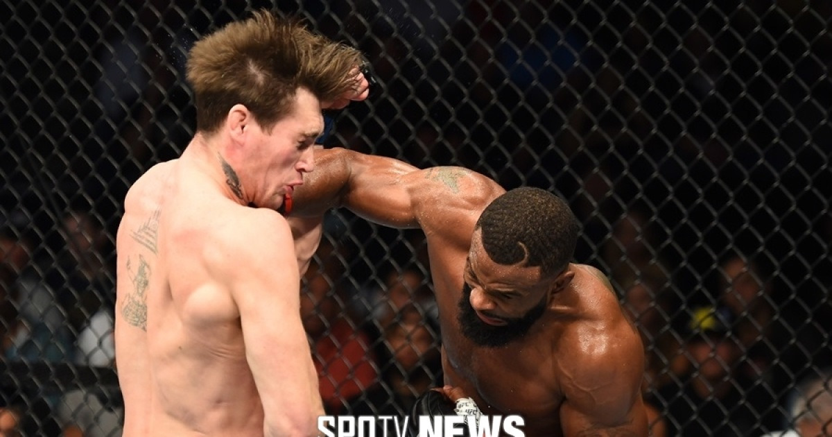 [오늘의 UFC] '영국風 잠재운' 우들리..틸 꺾고 타이틀 4차 방어
