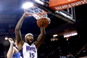 DeMarcus Cousins dunks the ball against the Denver Nuggets