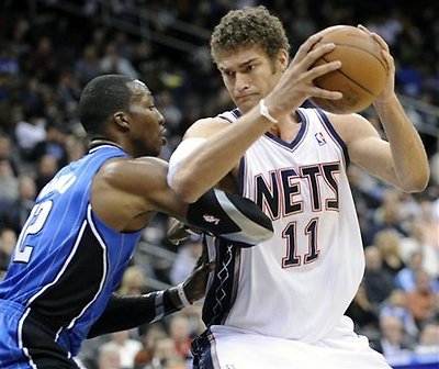 New Jersey Nets Center Brook Lopez, Right, Looks
