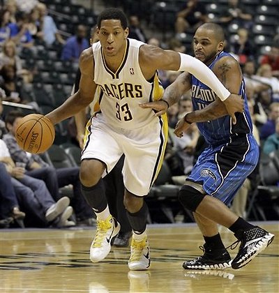 Indiana Pacers' Danny Granger, Left, Drives