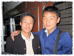 young men friends in subway