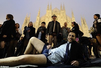Inspired by fashion: An Italian commuter on the Milan Subway poses like a model in his blue boxer shorts