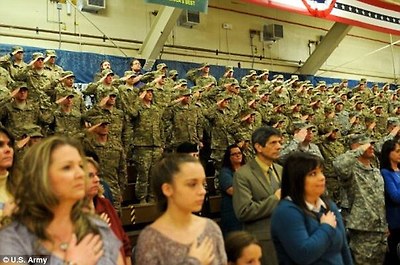 Soldiers, their family members and guests gather at Fort Carson, Colorado, ahead of their deployment to Kuwait, which opens up the possibility of intervening in Iraq