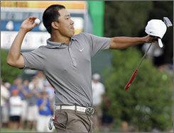 Anthony Kim shared his ball with the crowd after winning the Wachovia Championship.