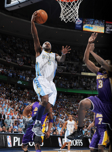 Ty Lawson #3 Of The Denver Nuggets Goes To The Basket Against Devin Ebanks #3 Of The Los Angeles Lakers In Game Six Of