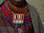 Northern Maasai, Samburu woman in traditional dress with beaded necklace.