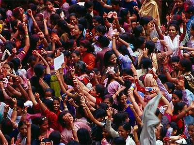  Women crowd streets in Lal Baug on Anant Chaturthi Hindu Festival Day