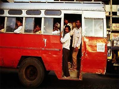  People find room on a crowded city bus