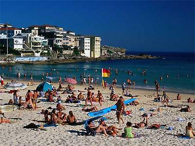  Sunbathers at North Bondi Beach on summer afternoon