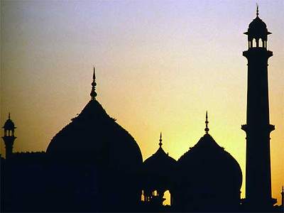 Sunset over domes and minarets of Jama Masjid