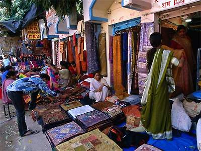Piles of Rajasthani fabrics for sale at Janpath Market