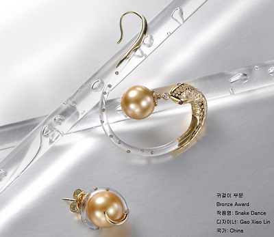 Earrings_(3)Bronze_9TH_Snake Dance.jpg