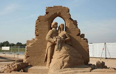 just married, sand looks like bricks, sand castle sculpting