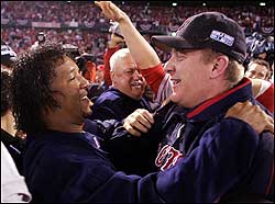 Pedro Martinez (left) and Curt Schilling