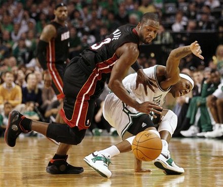 Miami Heat Guard Dwyane Wade, Left, Shoves