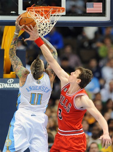 Chicago Bulls Center Omer Asik, Right, Of Turkey, Contests