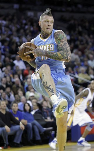 Denver Nuggets Center Chris Andersen (11) Gets