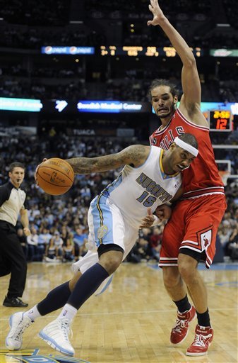 Denver Nuggets Forward Carmelo Anthony Drives