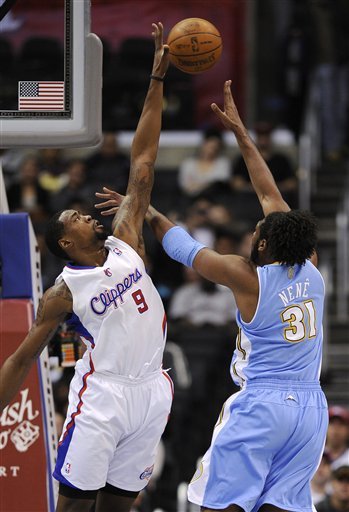 Los Angeles Clippers Center DeAndre Jordan, Left, Blocks