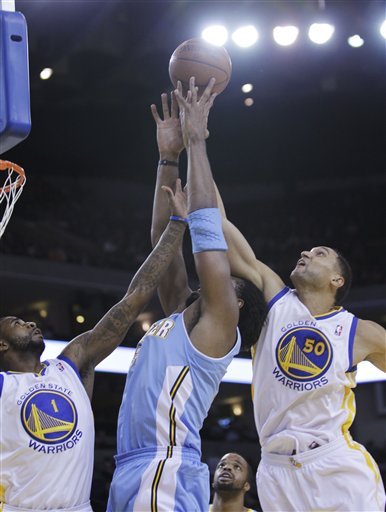 Golden State Warriors Small Forward Dorell Wright (1) And Center Dan Gadzuric (50) And Denver Nuggets Center Nene