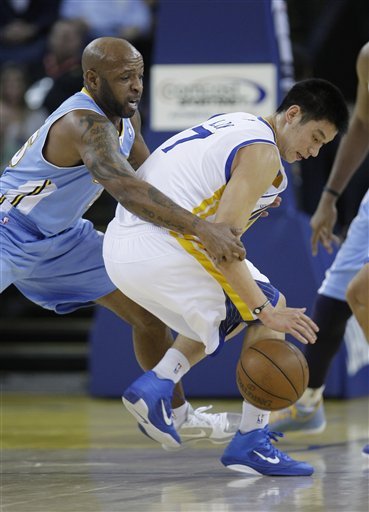 Denver Nuggets Point Guard Anthony Carter (25) Guards
