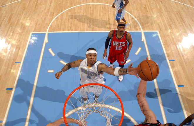 DENVER, CO - JANUARY 25: Kenyon Martin #4 of the Denver Nuggets goes for a rebound against the New Jersey Nets on January 25, 2008 at the Pepsi Center in Denver, Colorado. NOTE TO USER: User expressly acknowledges and agrees that, by downloading and/or using this Photograph, user is consenting to the terms and conditions of the Getty Images License Agreement. Mandatory Copyright Notice: Copyright 2008 NBAE. (Photo by Garrett W. Ellwood/NBAE/Getty Images)
