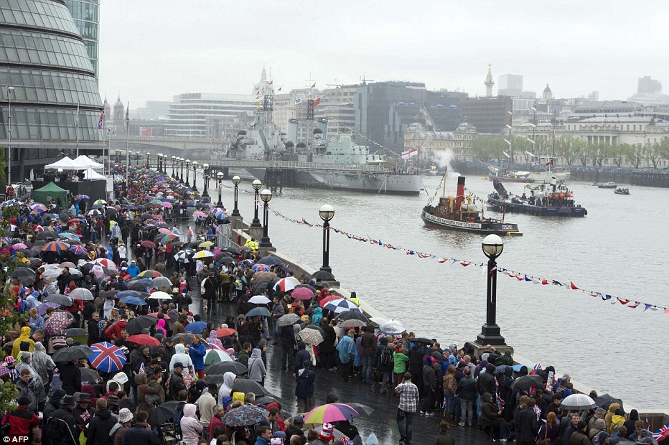 Supporters of the Queen gather in the cold weather as the Queen celebrates her Diamond Jubilee