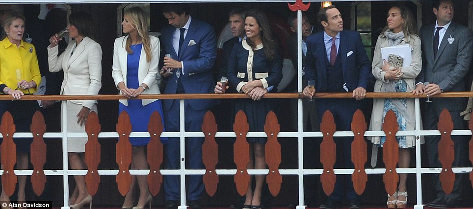 Spectacle: Pippa Middleton, with her brother James to her left and her father Michael behind, enjoy uninterrupted views of the Royal Pageant