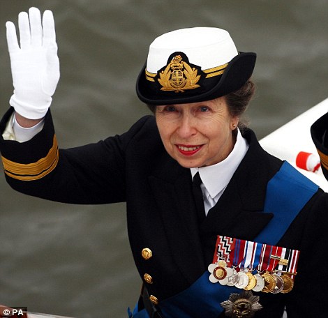Princess Royal waves to the crowds on Battersea Bridge during the Diamond Jubilee River Pageant along the River Thames,