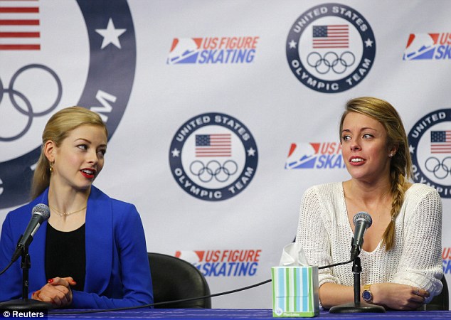 Figure skaters Gracie Gold and Ashley Wagner (right) talk to reporters after being introduced as part of the United States' women's figure skating team for the upcoming Sochi Winter Olympics