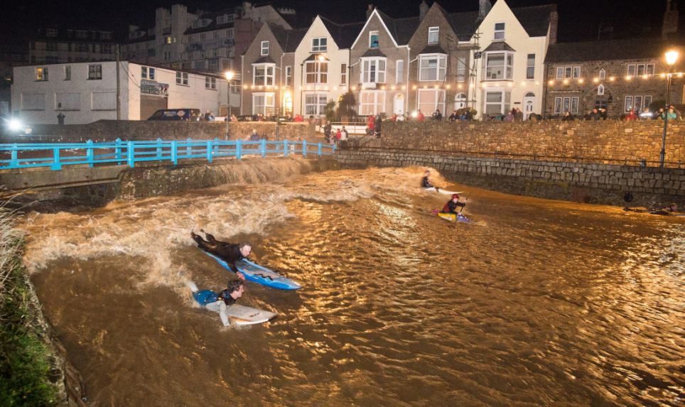 The water levels have risen so high in Bude, Cornwall, that some residents decided to seize the opportunity to kayak and surf