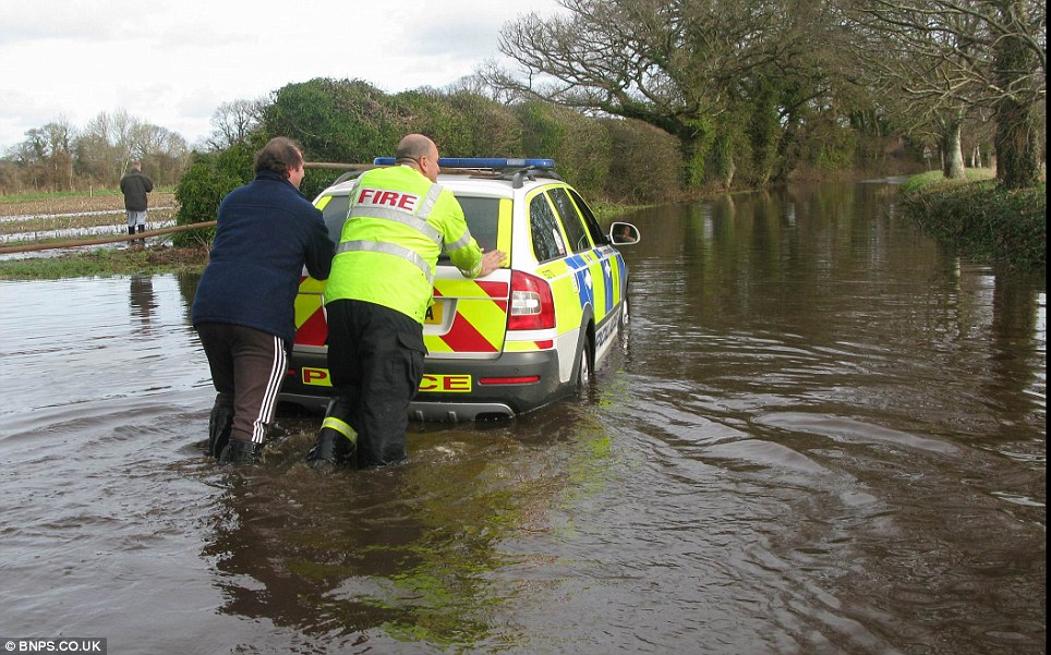 A Hampshire Police car had to be rescued from floodwaters in Derritt Lane near Bransgore today after stalling on the flooded road