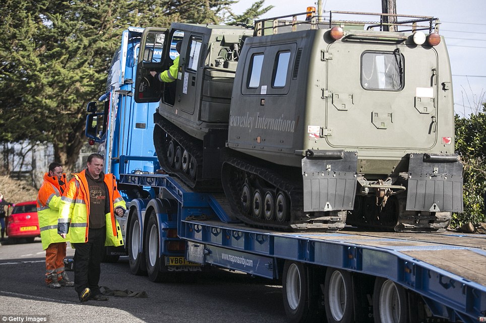 Vehicles are delivered to help with the recovery efforts in Muchelney, Langport, which has been hit with flooding