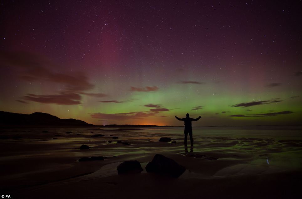 Colourful: The bay was lit up with purple, blue and green colours as millions of particles entered the earth's atmosphere
