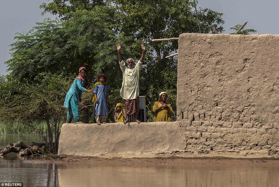 Rescue: Thousands of people have also been affected in Pakistan's Punjab province (pictured), where more than 250 people have died and cities are threatened