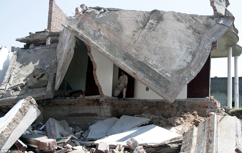 Nothing left: The disaster has flattened thousands of homes and forced their residents to flee the area. As the waters recede, the repair bill will mount higher