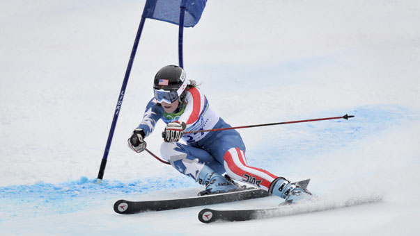 USA's Megan McJames, of Park City, Utah flies down the mountain on her first run of the giant slalom.