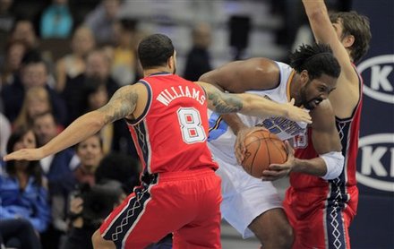 Denver Nuggets' Nene Hilario (31) Fights Through New Jersey Nets' Deron Williams (8) And Mehmet Okur (13), Of Turkey,