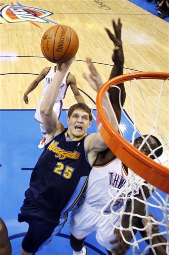 Denver Nuggets Center Timofey Mozgov (24), Of Russia, Shoots