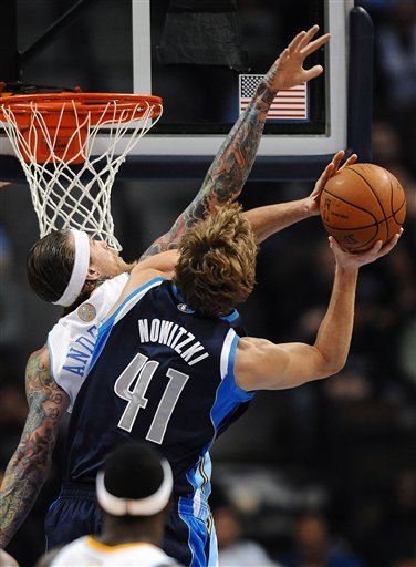 Denver Nuggets Forward Chris Andersen, Left, Tries