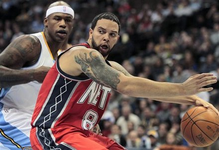 New Jersey Nets Point Guard Deron Williams (8) Drives