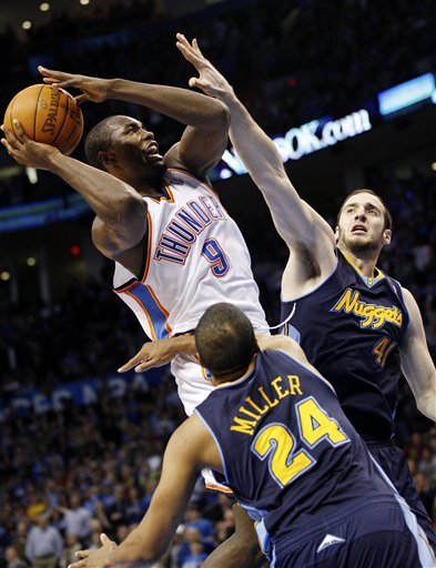 Oklahoma City Thunder Forward Serge Ibaka (9), Of Republic Of Congo, Shoots