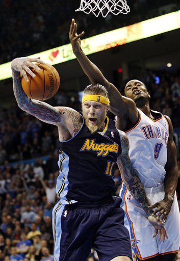 Denver Nuggets Center Chris Anderson (11) Grabs