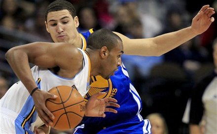 Denver Nuggets Guard Arron Afflalo, Front, Drives