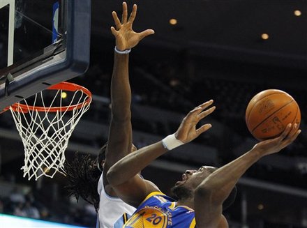 Golden State Warriors Forward Ekpe Udoh (20) Goes Up To Basket Against Denver Nuggets Forward Kenneth Faried, Rear Left,