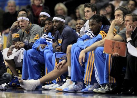 Denver Nuggets Forward Danilo Gallinari, Fourth From Right, Who Lead The Team With 22 Points, Sits On The Bench With An