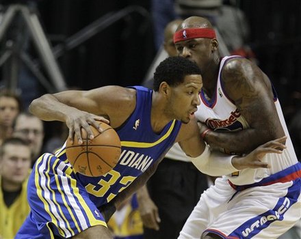 Indiana Pacers' Danny Granger, Left, Drives