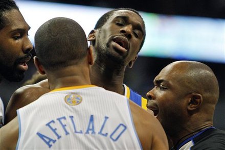 Golden State Warriors Forward Ekpe Udoh, Rear, Confronts Denver Nuggets Guard Arron Afflalo, Front, As Nuggets Center
